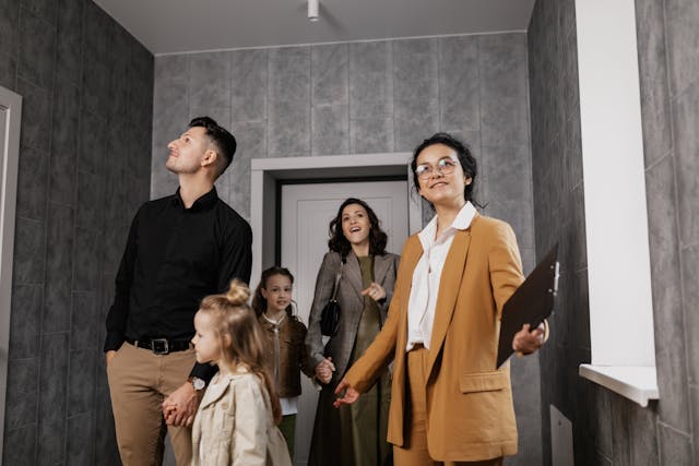 People viewing the interior of a home